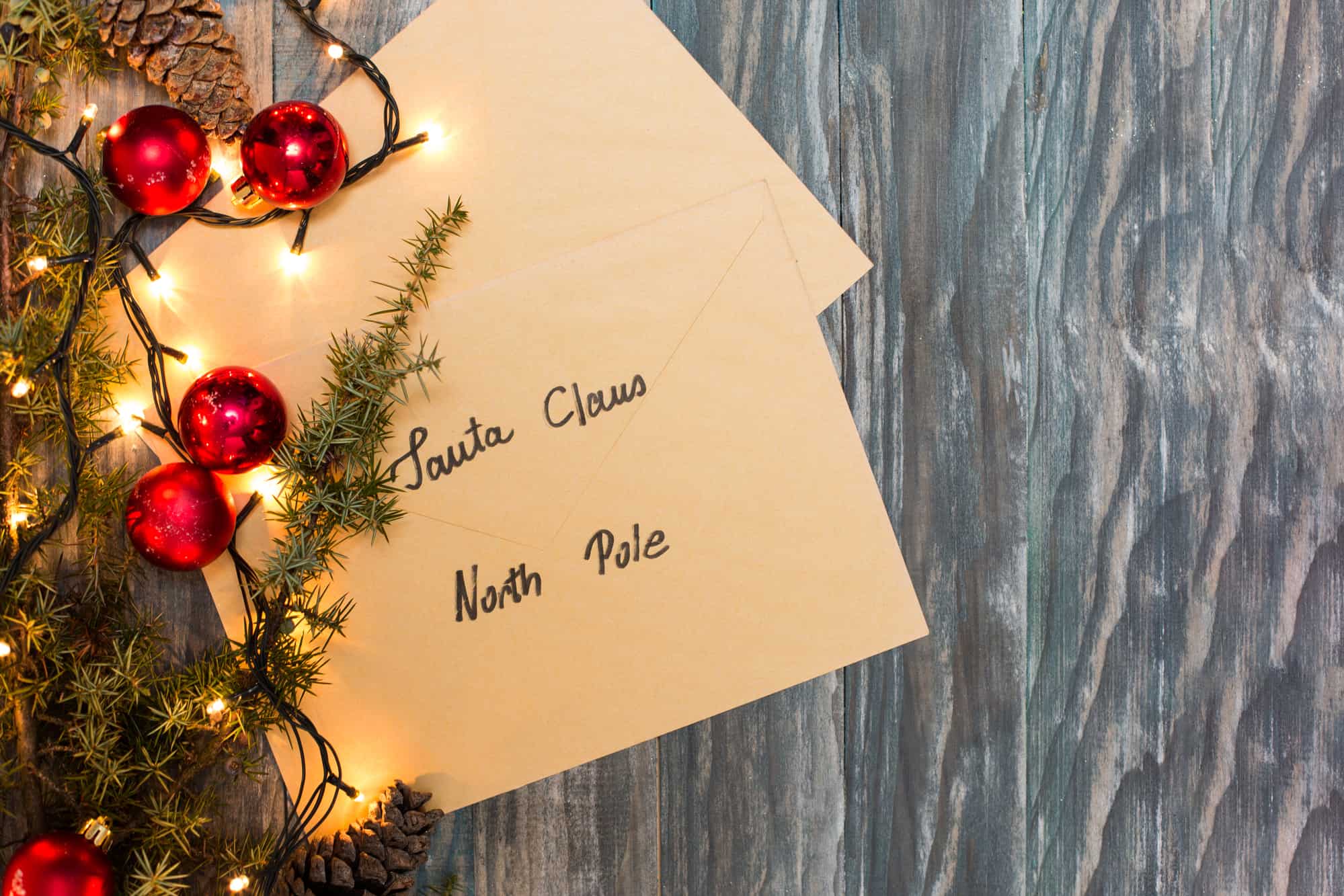 plain brown paper letter to Santa with christmas lights
