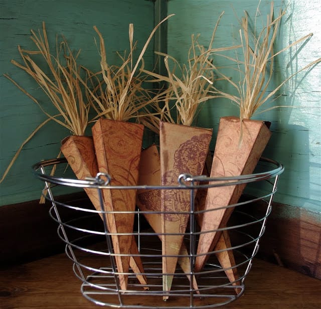 cardboard carrot favor boxes in a wire basket diy easter decoration